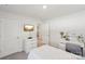 Airy bedroom with white walls, featuring mounted TV and comfortable furniture for a peaceful retreat at 2027 Redstone Dr, York, SC 29745