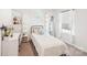 Bright bedroom featuring a well-lit desk, decorative shelves, and cozy single bed perfect for relaxation at 2027 Redstone Dr, York, SC 29745