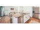 Modern kitchen island with granite countertops, stainless steel appliances, and an open floor plan to dining area at 2027 Redstone Dr, York, SC 29745