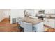 Bright kitchen with a large kitchen island, stainless steel appliances, and plenty of counter space at 2027 Redstone Dr, York, SC 29745