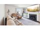 Comfortable living room with a fireplace, TV, and sliding glass door to back patio at 2027 Redstone Dr, York, SC 29745