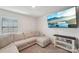 Living room features a sectional sofa, carpet, and tv at 2027 Redstone Dr, York, SC 29745