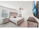 Spacious main bedroom features a ceiling fan, natural light, neutral decor, and tv at 2027 Redstone Dr, York, SC 29745