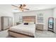 Spacious main bedroom features a ceiling fan, natural light, neutral decor, and carpet at 2027 Redstone Dr, York, SC 29745