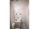 Bathroom featuring double sinks, vanity, modern tile flooring, and decorative mirror at 222 Baldwin Ct, Rock Hill, SC 29730