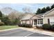 Well-maintained townhouse with manicured bushes, and a cozy front porch at 222 Baldwin Ct, Rock Hill, SC 29730