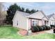 Traditional townhouse featuring cozy colors, complemented by manicured landscaping and a well-kept lawn at 222 Baldwin Ct, Rock Hill, SC 29730