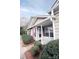 Comfortable townhouse with red shutters and well-manicured landscaping at 222 Baldwin Ct, Rock Hill, SC 29730