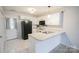 Efficient kitchen with black appliances and lots of counter space at 222 Baldwin Ct, Rock Hill, SC 29730