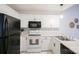 Kitchen with black appliances and stainless steel sink at 222 Baldwin Ct, Rock Hill, SC 29730