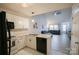 Stylish kitchen open to living room with stainless sink at 222 Baldwin Ct, Rock Hill, SC 29730