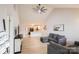 Bright living room with vaulted ceilings and modern decor open to kitchen at 222 Baldwin Ct, Rock Hill, SC 29730