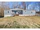 Charming single-story home featuring a welcoming front porch and a well-maintained yard at 2390 Old Wilkesboro Rd, Statesville, NC 28625