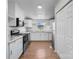 Modern kitchen with stainless steel appliances, subway tile backsplash, and white cabinetry at 2390 Old Wilkesboro Rd, Statesville, NC 28625