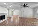 Spacious living room with a cozy fireplace and hardwood floors throughout at 2390 Old Wilkesboro Rd, Statesville, NC 28625