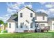Exterior view of home featuring spacious yard and deck in backyard at 2514 Waters Vista Cir, Charlotte, NC 28213
