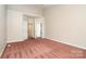 Spacious bedroom with access to an ensuite bathroom and walk-in closet, providing ample room at 2514 Waters Vista Cir, Charlotte, NC 28213