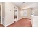 Upstairs hallway featuring neutral colors and wall to wall carpet is a must see! at 2514 Waters Vista Cir, Charlotte, NC 28213