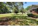 Expansive front yard with mature trees, offering a serene and inviting setting at 275 Ned Williams Rd, Kershaw, SC 29067