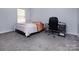 Bedroom featuring carpet, desk and a window at 3308 Lemongrass Ln, Charlotte, NC 28214