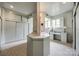 Large bathroom featuring custom vanity and vanity table at 3330 Foxcroft Rd, Charlotte, NC 28211