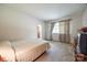 Comfortable bedroom with natural light and closet at 3330 Foxcroft Rd, Charlotte, NC 28211