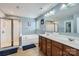 Primary bathroom featuring a glass shower, soaking tub, and double sink vanity at 4026 Clover Nw Rd, Concord, NC 28027