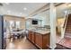 Open concept kitchen with stainless steel appliances, granite countertops and breakfast nook at 4026 Clover Nw Rd, Concord, NC 28027