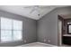 Light-filled bedroom with vaulted ceiling, ceiling fan, and a relaxing atmosphere at 4548 Antelope Ln, Charlotte, NC 28269