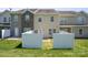 The back of this home features vinyl siding and a cozy fenced-in yard for privacy at 4554 Craigmoss Ln, Charlotte, NC 28278