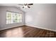 Bedroom featuring hardwood floors and natural light at 4554 Craigmoss Ln, Charlotte, NC 28278