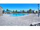 Beautiful community pool with ample seating and a pool house for a relaxing experience at 4554 Craigmoss Ln, Charlotte, NC 28278
