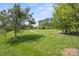 Lush green space with walking paths, providing a serene and picturesque community area for residents to enjoy at 4554 Craigmoss Ln, Charlotte, NC 28278