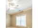 Bedroom featuring a ceiling fan and large window allowing natural light at 4599 Rustling Woods Dr, Denver, NC 28037