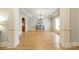 Spacious formal dining room with hardwood floors and beautiful architectural details at 4599 Rustling Woods Dr, Denver, NC 28037