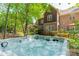 Relaxing hot tub with landscaped backyard in a beautiful home at 4599 Rustling Woods Dr, Denver, NC 28037