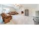 Large living area with comfortable seating and lots of light at 4599 Rustling Woods Dr, Denver, NC 28037