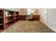 Dedicated home office space features custom cabinetry and ample workspace at 4599 Rustling Woods Dr, Denver, NC 28037