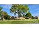Charming brick home with a well-kept lawn, beautiful mature trees, and a classic suburban appeal at 5119 Blackberry Ln, Matthews, NC 28104