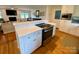 Kitchen with stainless steel oven and white counter seating at 5119 Blackberry Ln, Matthews, NC 28104