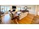 Spacious living room with hardwood floors and a fireplace at 5119 Blackberry Ln, Matthews, NC 28104