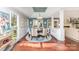 Dining room with a round table, chandelier, and lots of natural light at 5125 Waxwind Ln, Charlotte, NC 28226