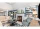 Cozy living room features a fireplace and built-in shelves for a stylish touch at 5125 Waxwind Ln, Charlotte, NC 28226