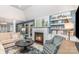 Cozy living room features a fireplace and built-in shelves for a stylish touch at 5125 Waxwind Ln, Charlotte, NC 28226