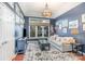 Comfortable living room with a large window, stylish decor, and ample natural light at 5125 Waxwind Ln, Charlotte, NC 28226