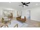 Bright living room with wood floors, neutral decor, and comfortable seating arrangement at 530 S Trenton St, Gastonia, NC 28052