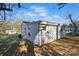 Rear exterior view of a cozy home featuring a small yard and simple architectural design at 530 S Trenton St, Gastonia, NC 28052