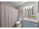 Bathroom featuring a single sink vanity with a shower/tub combination at 5510 Sardis Rd, Charlotte, NC 28270