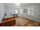 Cozy bedroom with hardwood floors, natural light, and classic decor, creating a warm and inviting space at 5510 Sardis Rd, Charlotte, NC 28270