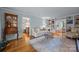 Relaxing living room with hardwood floors, built-in bookshelves, and comfortable seating for entertaining guests at 5510 Sardis Rd, Charlotte, NC 28270